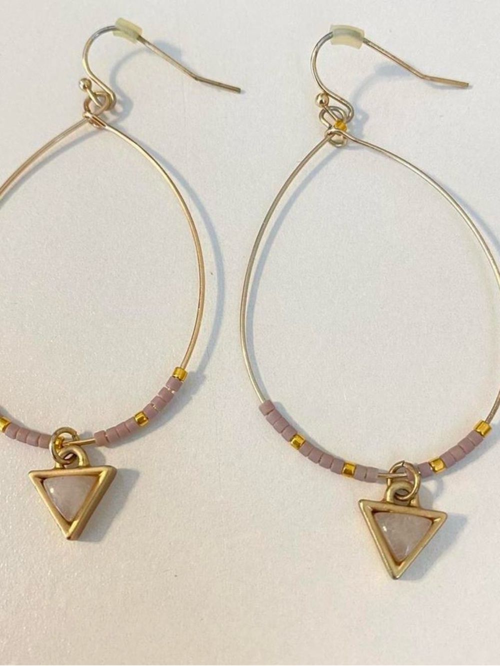 gold toned beaded hoop earrings